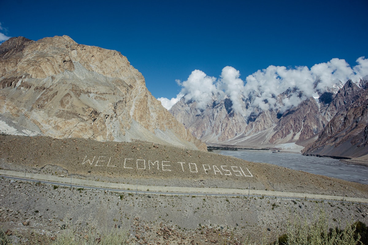 Remote Karakoram valley with glacier and dramatic rock walls, Pakistan
