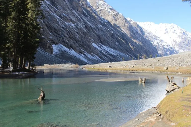 Rush Lake at 4694m above Nagar Valley with Rakaposhi peak behind, Pakistan