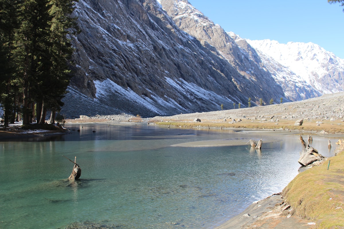 Rush Lake at 4694m above Nagar Valley with Rakaposhi peak behind, Pakistan