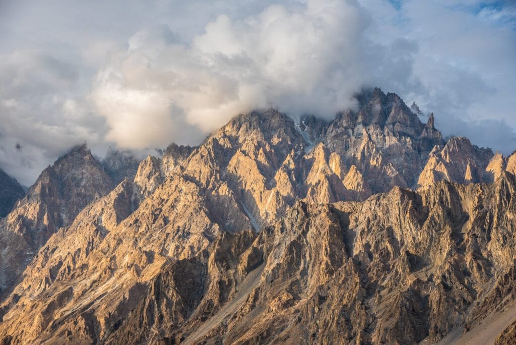The jagged Passu Cones (Tupopdan) rising above the Hunza valley