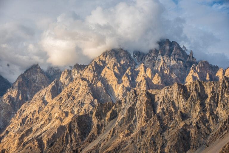 The jagged Passu Cones (Tupopdan) rising above the Hunza valley