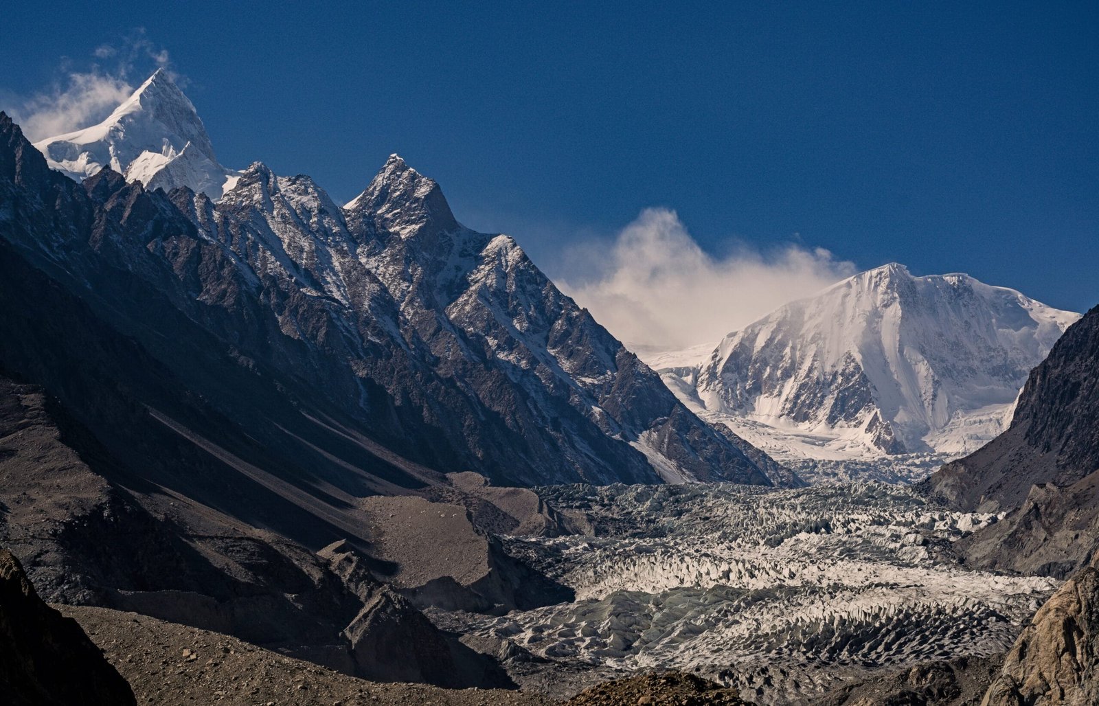 Passu Peak rising above the crevassed Passu Glacier