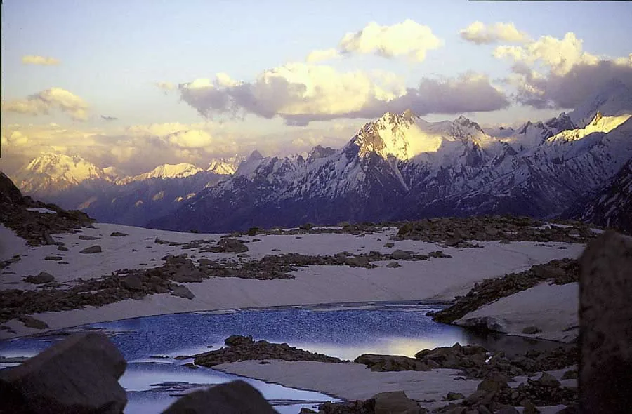 Baintha campsite, a green meadow beside the Biafo Glacier used as a rest day on the Snow Lake trek