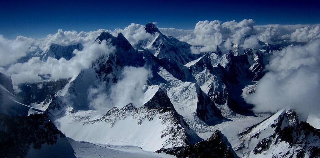 Broad Peak (8,051 m) and K2 (8,611 m) seen from high on Gasherbrum II, the 8000m peaks above the Baltoro Glacier