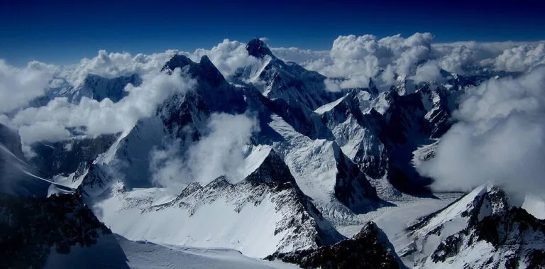 Broad Peak (8,051 m) and K2 (8,611 m) seen from high on Gasherbrum II, the 8000m peaks above the Baltoro Glacier