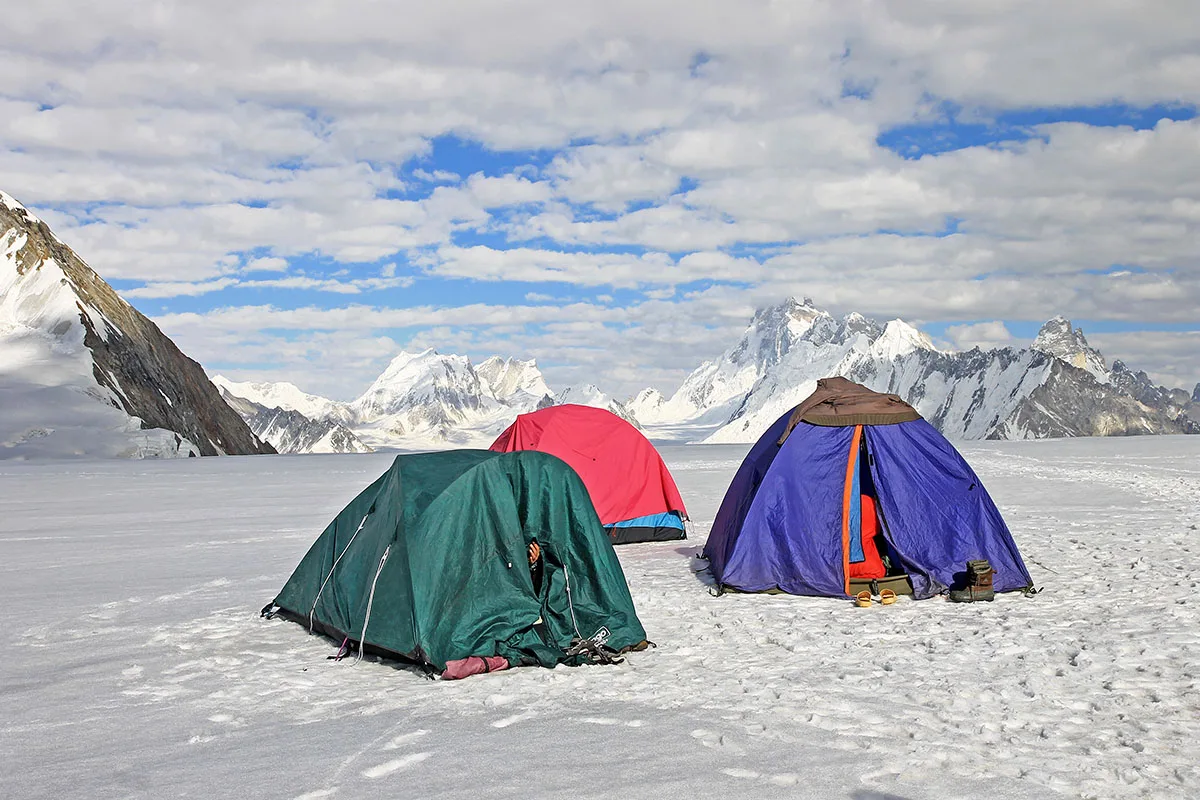 Trekkers on top of Hispar La pass, around 5,128 m, the watershed between the Biafo and Hispar glaciers