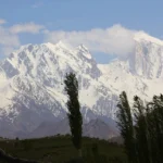 Snow peaks of the Nagar Valley including Spantik rising above the Rush Lake plateau in Gilgit-Baltistan