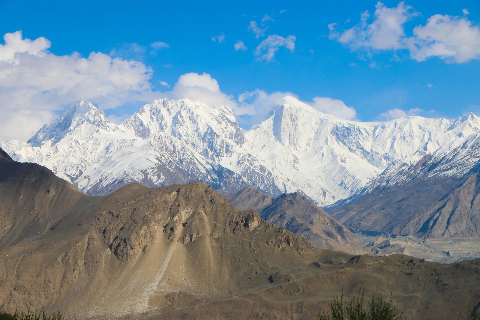 Spantik (Golden Peak) rising on the horizon as seen from the Eagle Nest viewpoint above Hunza