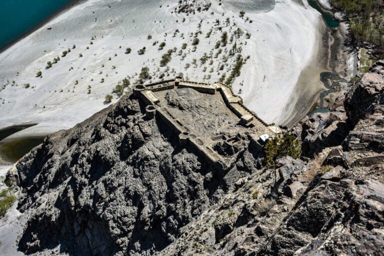 Aerial view of Kharpocho Fort perched on a rocky spur above Skardu town and the Indus River