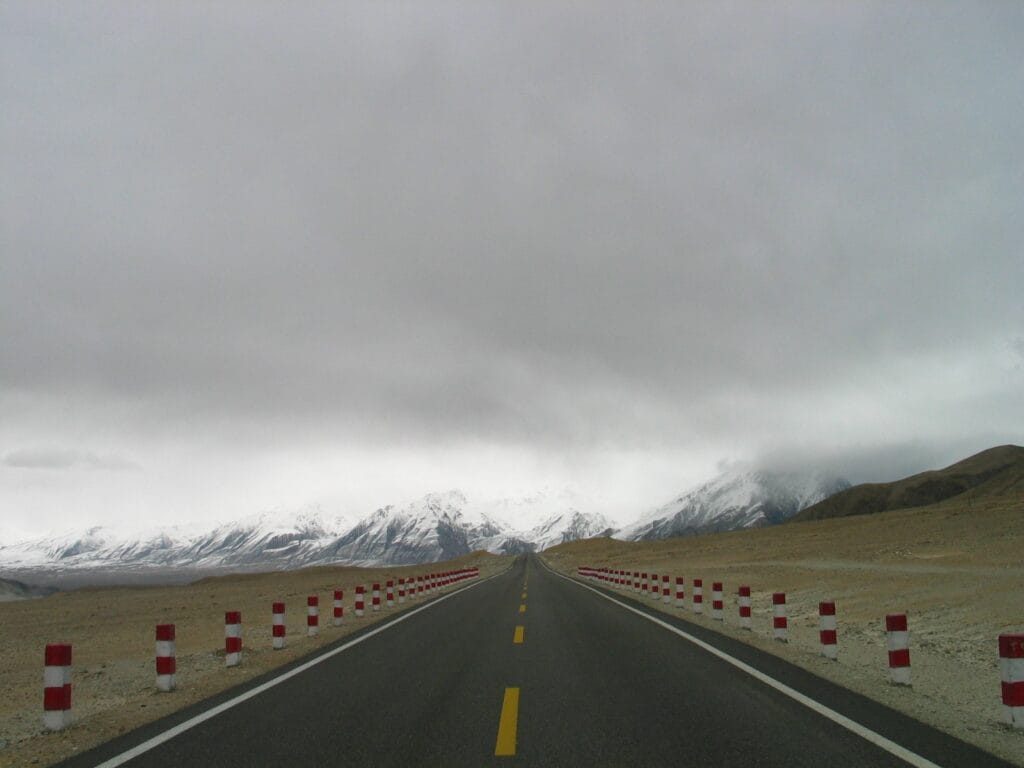 Paved road crossing the high-altitude Khunjerab Pass on the Karakoram Highway