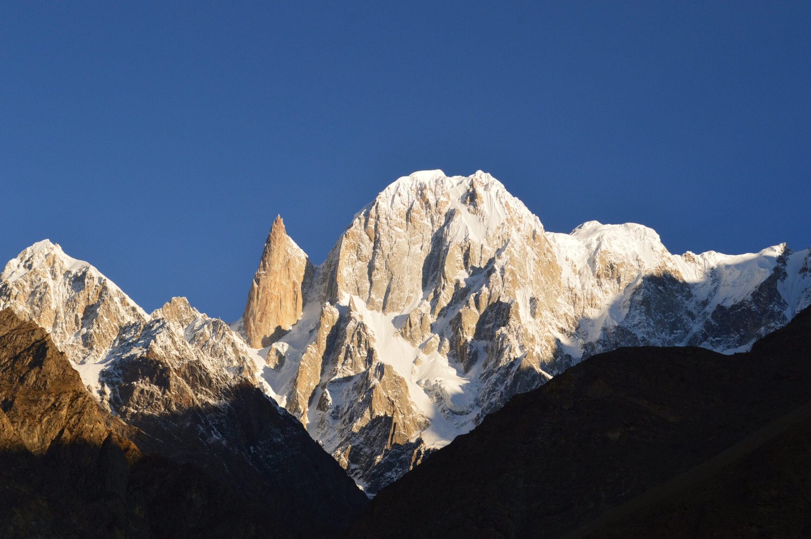 Ladyfinger Peak spire and the Ultar Sar massif above Hunza Valley