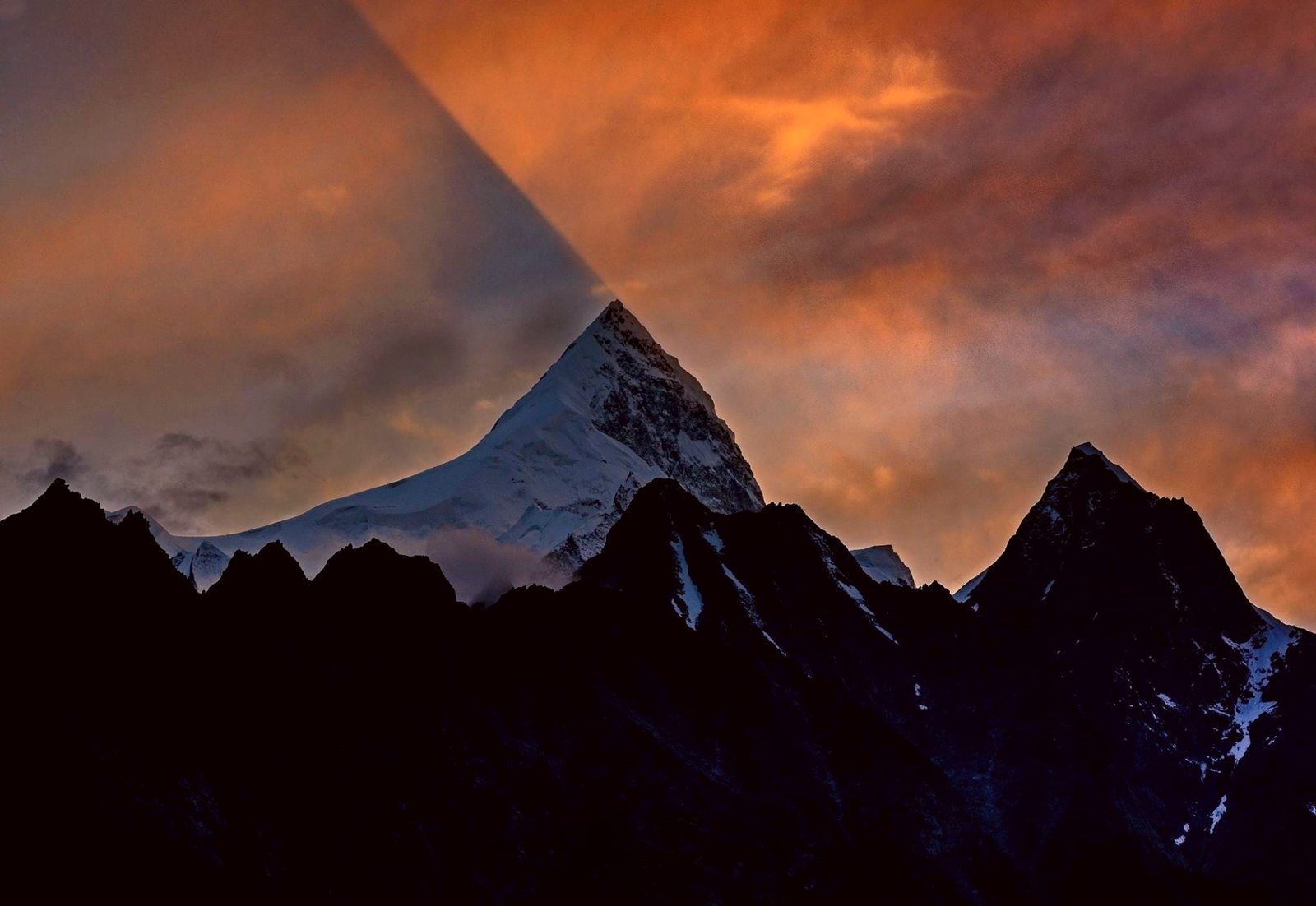 Evening light on the summit of Shispare seen from near Passu village, Gojal, Gilgit-Baltistan