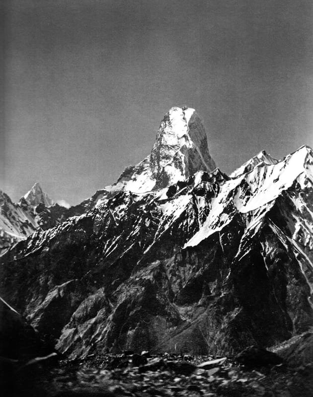The twin summits of the Muztagh Tower seen from the upper Baltoro Glacier, photographed in 1909