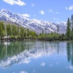 The turquoise waters of Phander Lake surrounded by the Phander Valley in Gilgit-Baltistan