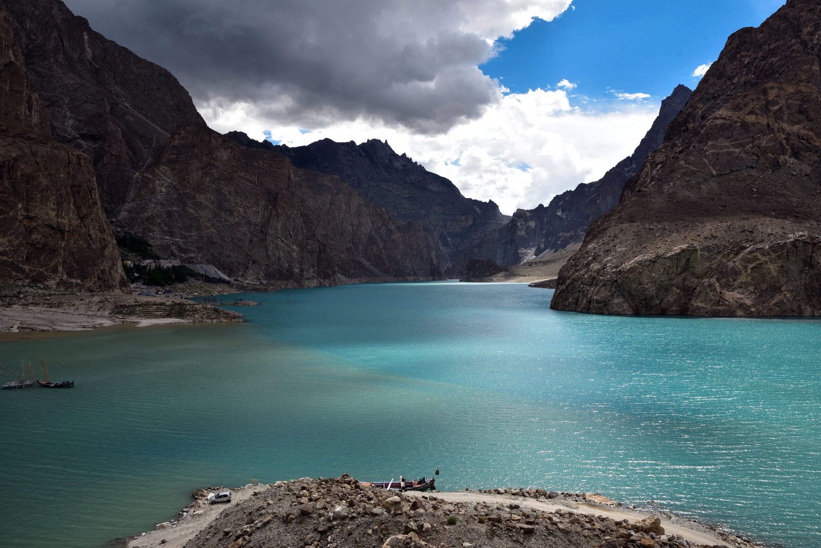 The turquoise water of Attabad Lake between bare rock walls in Gojal, Upper Hunza