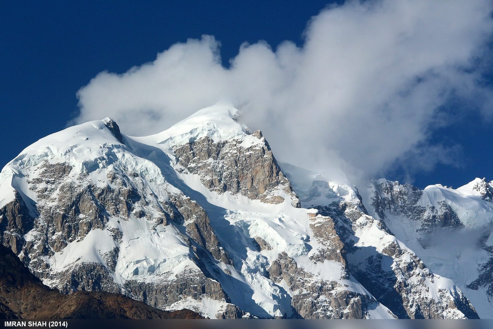 Bojohagur Duanasir 7329 m rising above Aliabad in the Hunza Valley