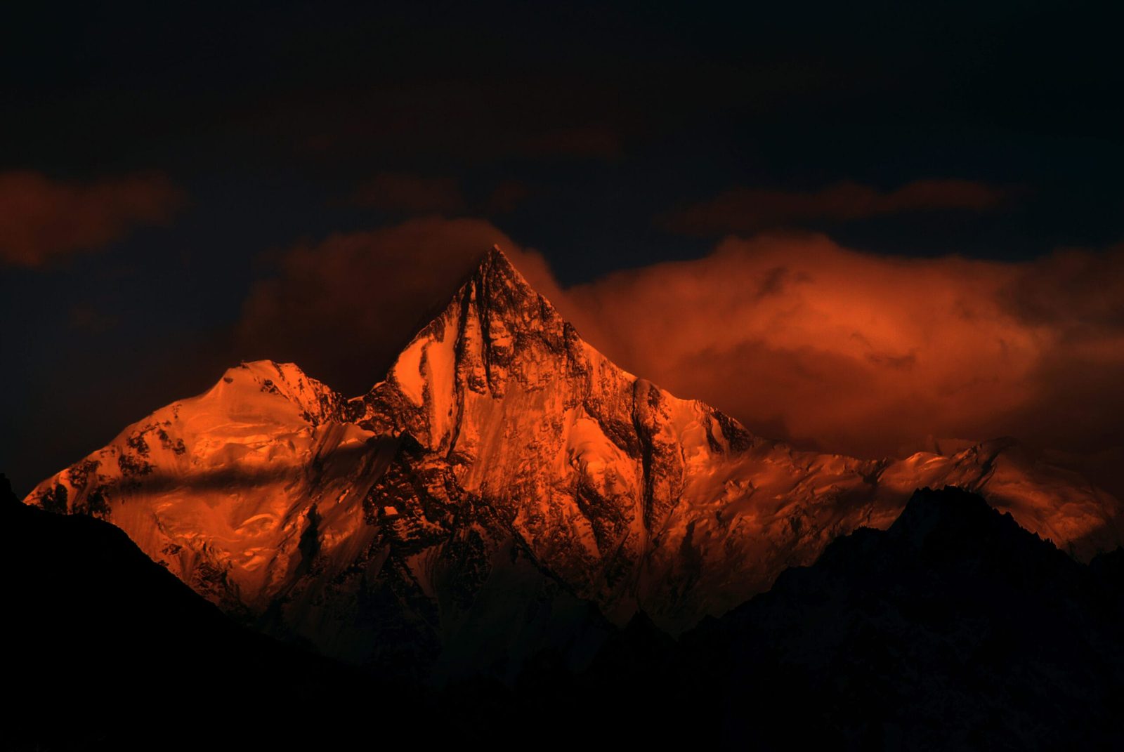 Lupghar Sar peak, 7,200 m, seen in evening light above the Hunza Valley, Gilgit-Baltistan