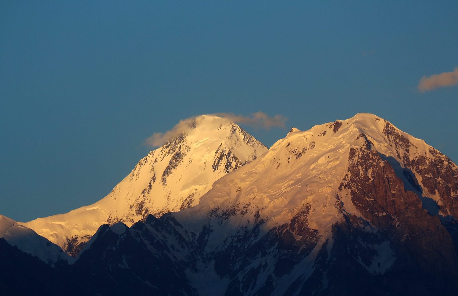 Momhil Sar, a snow-covered 7,000 m peak of the Hispar Muztagh, seen from Aliabad in Hunza