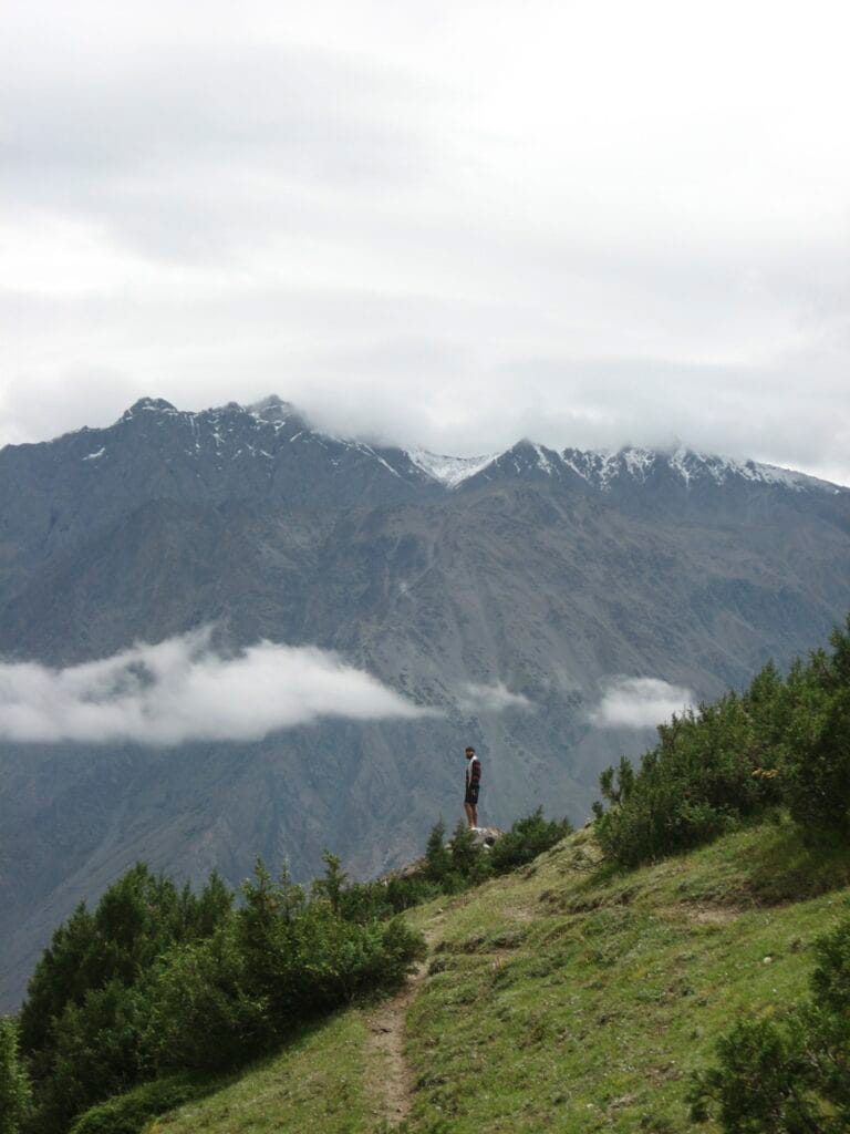 Trekkers on the rocky approach slopes below Burji La pass above Skardu, Gilgit-Baltistan