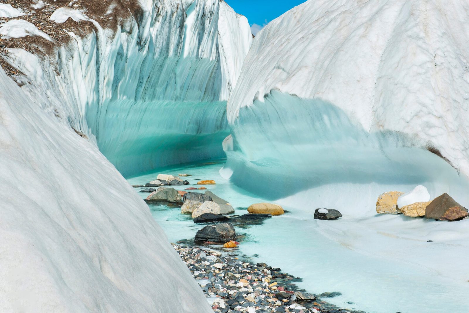 Meltwater river running across the Baltoro Glacier near Concordia camp
