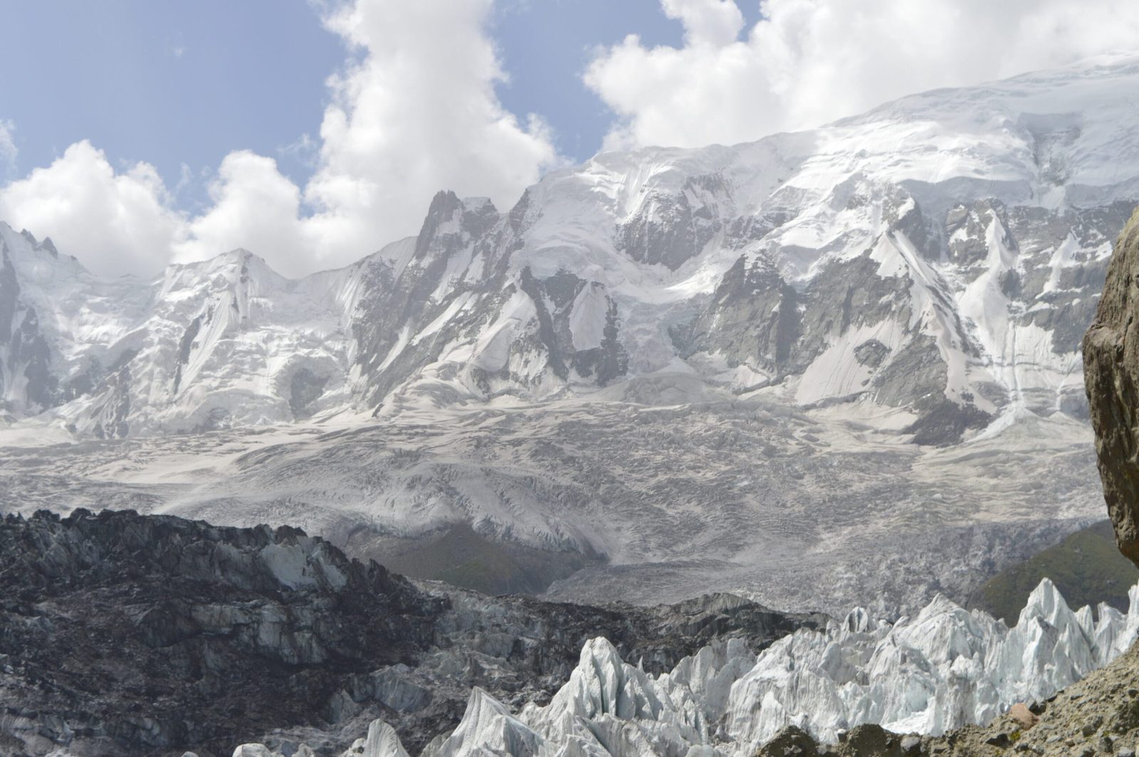 The snow pyramid of Diran Peak rising above Nagar Valley in Gilgit-Baltistan