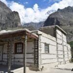 Baltit Fort standing above Karimabad in the Hunza valley with Ultar Sar rising behind it