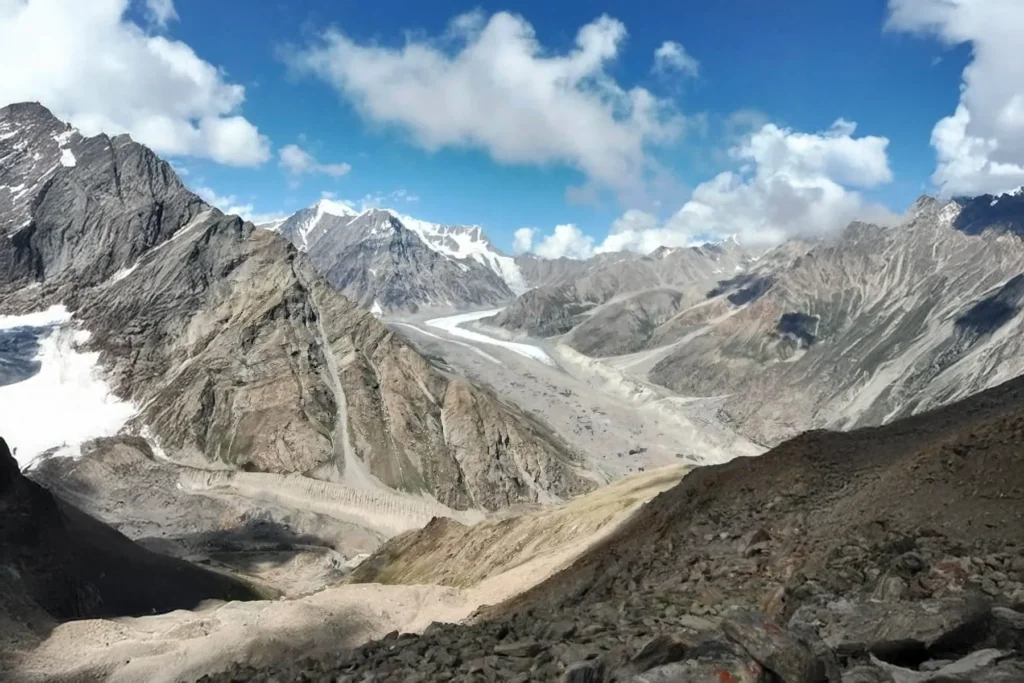 Wide glacier valley under a deep blue sky in the Karakoram