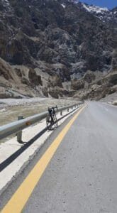 A bicycle on the Karakoram Highway climbing toward the Khunjerab Pass